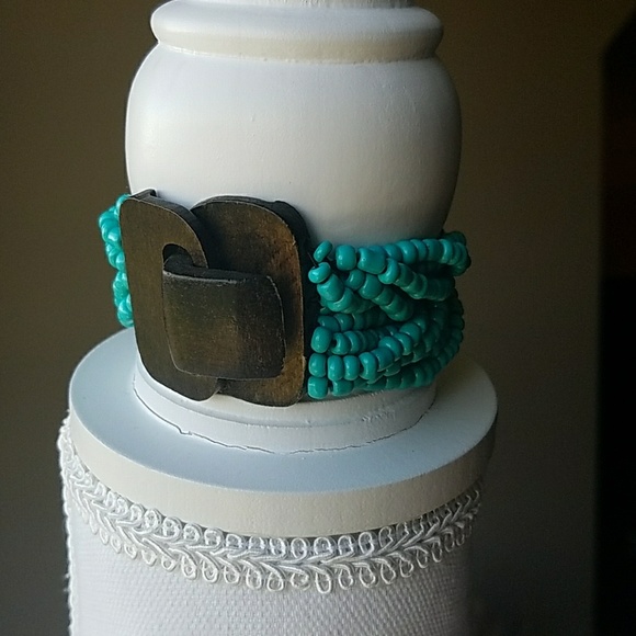 Jewelry - Beautiful beaded bracelet with wooden clasp.